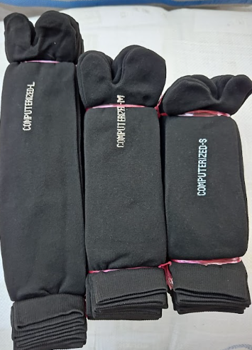 Kaos kaki muslimah jempol